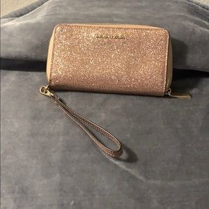 Michael Kors rose gold wristlet